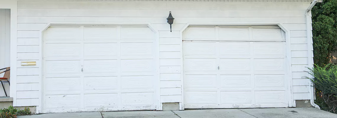 Roller Garage Door Dropped Down Replacement in Pompano Beach, FL